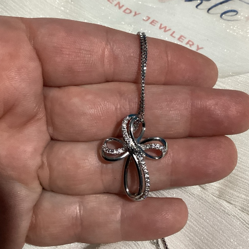 Faithful Elegance Ribbon Style Silver Twisted Cross Pendant Necklace